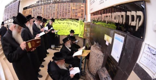 Rabbis praying to help Israel at Rebbe Meir Baal Haness kever