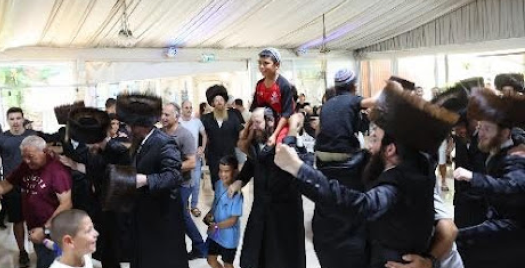 RMBH dancing to help Israel refugees and bring cheer